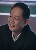 丁学坤（王志文饰演）